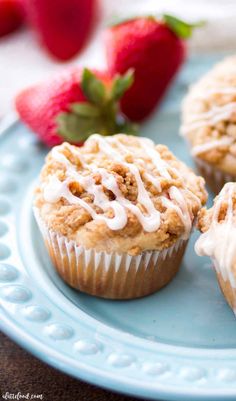 strawberries and cream cake muffins on a blue plate