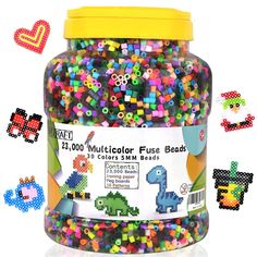 a jar filled with lots of colorful beads next to hearts and other things in it