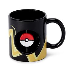 a black coffee mug with a red and white pokeball on it