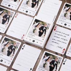 playing cards with pictures of the bride and groom are laid out on a wooden table