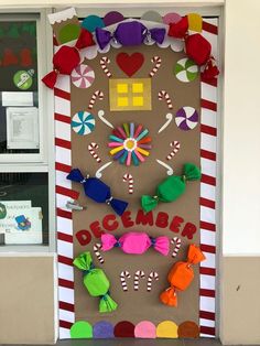 a bulletin board decorated with candy canes and candies