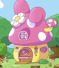 a pink mushroom house with flowers on it's roof