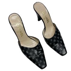 Condition Is Pre Owned. No Box Or Dust Bag. Some Sign Of Wear. Slip On. All-Over Pattern On Smooth Leather. The White-On-Black Print Distinguishes The Upper On The Mule Silhouette. The Vamp Is Long To Best Display Itand To Snugly Secure The Foot. A Rectangular Toe Box Echoes The Distinctive Heel Shape, With Its Artful Curve That Is Visible From The Side And It Geometric Minimalism That Presents Itself From The Back. The Heel’s Low Height Makes It A Walking Shoe, And A Wardrobe Basic That Can Pai Chanel Shoes Heels White, Mules Heels, Chanel Black And White, Chanel Black, Leather Logo, Chanel Shoes, Heels Shoes, Black Print, Womens Heels