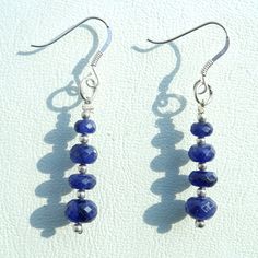 Product Type:---------------------> Natural Blue Sapphire Earrings. Stone Name:-------------------*--> Natural Blue Saphire. Beads Size:-----------------------------> 5.5MM to 7.5MM Approx. Material:-------------------------------> Made with 92.5 Sterling Silver Clasps. oººooººooººooººooººooººo FAST SHIPPING IF YOU GET FAST SHIPPING This is additional express shipping please add this item if you need express shipping. https://www.etsy.com/in-en/listing/709087998/dhl-aramax-fedex-speedpost-additi Sapphire Dangle Earrings In Sterling Silver, Sapphire Sterling Silver Dangle Earrings, Blue Sapphire Dangle Earrings, Blue Round Faceted Earrings, Blue Faceted Round Earrings, Hypoallergenic Sapphire Dangle Earrings, Blue Faceted Dangle Earrings, Sapphire Dangle Earrings, Blue Sapphire Earrings