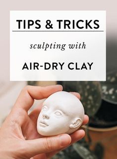 a hand holding a white clay face with text overlay that reads tips & tricks sculpting with air - dry clay