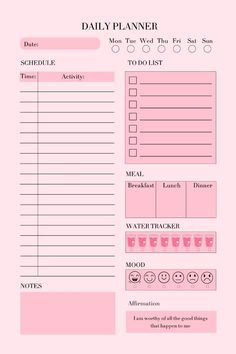 the daily planner is pink and has smiley faces on it