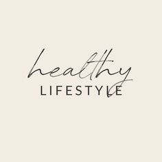 the words healthy life written in cursive writing on a white background with black ink