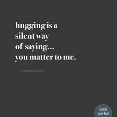 a black and white photo with the words hugging is a silent way of saying you matter to me