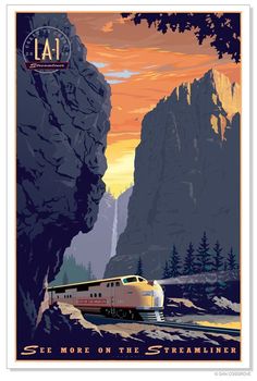 an image of a train going down the tracks in front of some mountains and trees