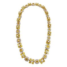 A natural yellow Ceylon sapphire diamond necklace by Van Cleef & Arpels. The necklace is beautifully finished in 18kt yellow gold followed by a pattern of sapphires and diamonds. The necklace is 17.50 in long. The Yellow Sapphire is 65.0 carats and the Diamonds are 10.0 carats. Signed VCA NY Registry number 54673 Van Cleef And Arpels High Jewelry, Most Expensive Pearl, Necklace Van Cleef, Van Cleef Necklace, Sapphire Diamond Necklace, Van Cleef And Arpels Jewelry, The Bling Ring, Van Cleef & Arpels, Van Cleef And Arpels