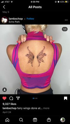 a woman with a tattoo on her back