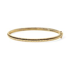 The Gold Ridged Bangle offers a stylish and contemporary option for those seeking a distinctive piece of jewelry that combines classic materials with modern design elements. The perfect addition to any existing arm candy or a great starter piece. Available in 14K Yellow Gold Bangle width = 3.8mm Wrist Sizes: XS = 15-16cm Small = 17cm Modern 14k Gold Diamond Bracelet With Polished Finish, Modern Yellow Gold Diamond Bracelet With Polished Finish, Modern Yellow Gold Polished Diamond Bracelet, Modern Yellow Gold Round Diamond Bracelet, Modern Yellow Gold Bracelet With Strap, Modern Yellow Gold Bangle Diamond Bracelet, Modern White Gold Bangle Bracelet, Modern Flexible Round Bangle, Modern Gold Bracelet With Polished Finish For Everyday Luxury