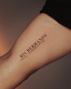 a woman's arm with the words miss hermans written in cursive font