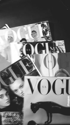 black and white photograph of various magazine covers