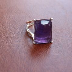 Gemstone - Amethyst Size - 13x18 rectangle Metal - sterling silver Natural purple amethyst ring available in all ring sizes Amethyst strengthens the aura of the wearer and creates your dominance among others The same design also available with many other gemstones please visit my shop to view the complete collection. feel free to contact me for any query regarding my jewelry Each order will be packed in the free handmade jewelry box Classic Amethyst Ring With Rectangular Stone For Gift, Classic Amethyst Ring With Rectangular Stone, Promise Ring With Polished Finish And Rectangular Stone, Formal Birthstone Ring With Rectangular Stone, Rectangular Stone Promise Ring With Polished Finish, Formal Purple Rings With Rectangular Stone, Square Cut Crystal Gemstone Ring Gift, Rectangular Amethyst Ring For Gift, Rectangular Amethyst Ring For Formal Occasions