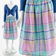 - 80s pastel rainbow madras skirt - elastic waist - pockets on side seams - knee length Fits like:  S - M Material:  Cotton Condition:  Great Clipped on Mannequin:  No ✂ SIZE + FIT ✂ Length: 28" / 71 cm Waist: 26" to 34" / 66 cm to 86 cm Hips: 54" / 137 cm All measurements are taken with garment lying flat. ALWAYS refer to measurements as vintage sizes can vary greatly from today's modern sizes. We recommend comparing measurements above with a similar style garment you own for best fit before pu Casual Multicolor Skirt With Pockets, Multicolor Knee-length Cotton Skirt, Multicolor Cotton Knee-length Skirt, Casual Multicolor Cotton Skirt, Plaid Knee-length Summer Skirt, Plaid Knee-length Skirt For Summer, Plaid Full Skirt Bottoms For Summer, Casual Multicolor Knee-length Bottoms, 80s Pastel