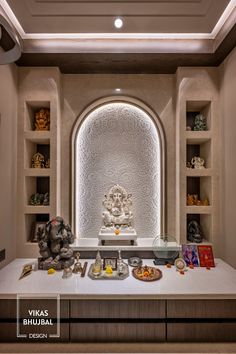 a room filled with lots of different items on top of a white counter topped with shelves