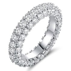 a white gold ring with rows of round cut diamonds on the inside and outside of it