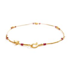 24K yellow gold, ruby beads 0.90cts total weight Preserving a piece of history from Ancient Anatolia, Fatih translates the master craftsmanship of prehistoric eminence into contemporary works of art. As show with: Gold and Emerald Bracelet, Gold and Sapphire Bracelet, and Gold and Lapis Bracelet. • 8" (20.32cm) length • 0.10" (0.25cm) maximum width • Hook and eye clasp Yellow Gold Ruby Bead Jewelry, Traditional Yellow Gold Bracelets With Gemstones, Elegant Ruby Jewelry For Puja, Ceremonial Gold Bracelets With Gemstones, Gold Single Strand Spiritual Bracelet, Gold Ruby Single Strand Jewelry, Luxury Gold Ruby Bracelets, Gold Ruby Gemstone Beads Jewelry, Formal Gold Bracelets With Gemstone Beads