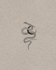 a drawing of a snake on the side of a piece of paper