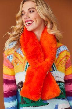 Add a fun and fluffy feel to your wardrobe with our orange Faux Fur Keyhole Scarf. Made from the finest quality faux fur it is sure to add a glamorous touch to any outfit.  15% Acrylic 85% Modacrylic Cheap Orange Statement Necklace, Orange Winter Shawl Scarf, Fox Tail Scarf Fur Scarves, Orange Faux Fur Fabric, Leather Coat Jacket, Faux Fur Material, Fur Headband, Faux Fur Scarves, Orange Scarf