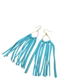 I have made this striking pair of earrings using the finest quality turquoise leather. Each tassel has been hand cut and the leather is so soft and light, you will barely feel that you are wearing earrings.  They measure 4 inches at their longest point but can be trimmed if you prefer them shorter. The earring hooks and gold accent are gold plated. If you would like a different length, please let me know. Leather Tassel Earrings, Leather Fringe Earrings, Teal Leather, Hippie Earrings, Light Earrings, Earring Trends, Turquoise Leather, Earrings Turquoise, Lightweight Earrings