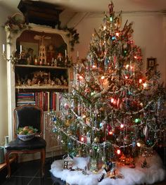 a decorated christmas tree in a living room