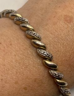 Vintage Diamond Charm Bracelet Golden 925 Sterling Silver https://www.etsy.com/listing/1201658347/vintage-diamond-charm-bracelet-golden?utm_source=crowdfire&utm_medium=api&utm_campaign=api Sterling Silver Hallmarked Bracelet For Anniversary, Hallmarked Sterling Silver Anniversary Bracelet, Hallmarked Sterling Silver Bracelet For Anniversary, Gold Sterling Silver Tennis Bracelet With Diamond Accents, Anniversary Hallmarked Sterling Silver Bracelet, Hallmarked Diamond Tennis Bracelet For Anniversary, Diamond Hallmarked Tennis Bracelet For Anniversary, Sterling Silver Diamond Bracelet With Pave Setting For Anniversary, White Gold Hallmarked Diamond Bracelet For Anniversary