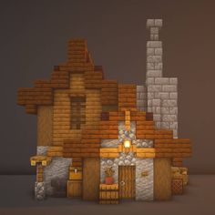 a small house made out of wood and stone blocks with a light at the top