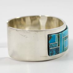 Sterling Silver Cuff Bracelet with Channel Inlaid Kingman Turquoise from Arizona.1” Cuff Width5.75” Inside Measurement, plus 1.125” opening(6.875" Total Circumference - Medium-Large) Sterling Silver Cuff Bracelet, Kingman Turquoise, Sterling Silver Cuff, Silver Cuff Bracelet, Silver Cuff, Cuff Bracelet, Cuff, Turquoise, Bracelet