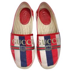 Step into style with the Gucci Sylvie Logo Espadrilles—an iconic pair that effortlessly combines classic design with a vibrant pop of color. These espadrilles aren't just shoes; they are a statement of comfort, fashion, and the unmistakable flair of Gucci. Picture yourself in these classic espadrilles featuring red, white, and blue stripes, adorned with a large Gucci logo in the center. The boat-style design adds a touch of casual sophistication, making these shoes a versatile addition to your w Gucci White Round Toe Espadrilles, Gucci Casual Espadrilles For Vacation, White Gucci Espadrilles For Spring, White Casual Gucci Espadrilles, Casual Gucci Espadrilles For Vacation, Trendy Flat Espadrilles, Casual Gucci Espadrilles For Spring, Gucci Espadrilles With Round Toe And Branded Insole, Gucci Casual Round Toe Espadrilles