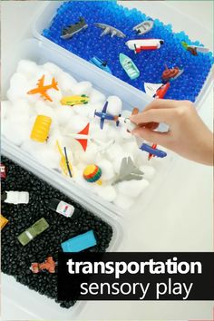 a plastic container filled with different types of toy boats and planes on top of a white table