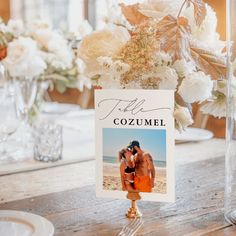 there is a card on the table that says to me cozumel with an image of two people kissing