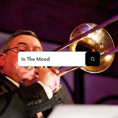 a man in a tuxedo playing a trombone with the words in the mood