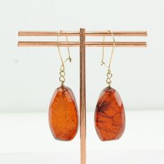 "These vintage amber earrings are 15/16\" long, and 1/2\" wide The earrings weigh 3.9 Grams The Stone/Theme is Amber - Natural, heated amber Size/Stone measurement (if any) are 24.1 x 13.4 mm  Markings: Not marked The condition of the earrings is Estate, Very good, a few surface scratches, light patina, Amber stone is crazed Extra Note: Hooks are not Sterling Silver, they are gold in color, either gold-filled or karat gold, but we haven't tested them Circa 1960 Thank you for viewing my item!" Vintage Sterling Silver Rings, Amber Earrings, Sterling Silver Brooch, Amber Stone, Turquoise Rings, Old Jewelry, Silver Brooch, Rings Simple, Antique Rings