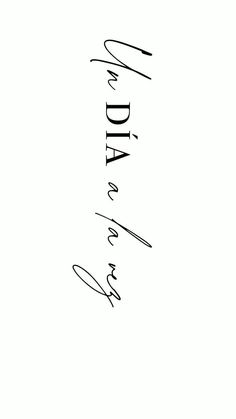 a black and white photo with the word aida written in cursive writing