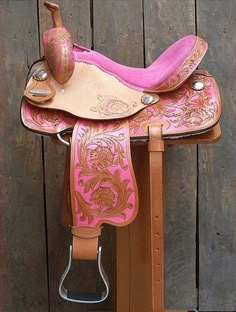 a pink and brown horse saddle