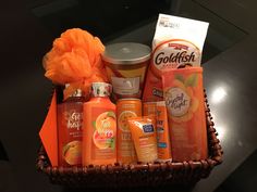 a basket filled with lots of orange products