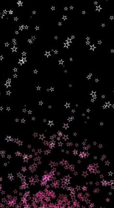 pink and white stars against a black background