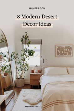 a bedroom with white walls and wooden floors, plants on the floor, and a large mirror