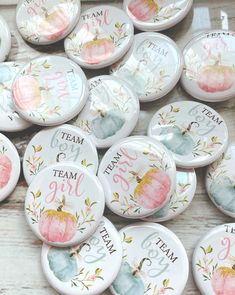 many buttons with different designs and names on them