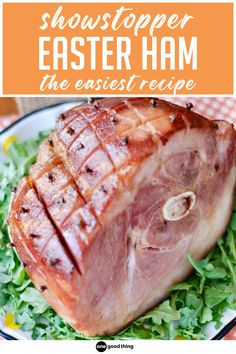 glazed ham on a plate with text overlay showstopper easter ham the easiest recipe.