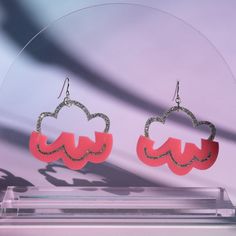 Say hello to Chroma Cloud: your new favorite lightweight earrings. These dreamy pink and silver cloud earrings are the perfect way to make sure you're having a good day, no matter what happens. Made from sparkly silver and pink acrylic, these earrings are finished with nickel-free sterling silver fill ear wires, so you can rock these babies without worrying about metal allergies or skin irritation. Trendy Pink Earrings, Trendy Pink Hypoallergenic Earrings, Trendy Hypoallergenic Pink Earrings, Trendy Pink Sterling Silver Earrings, Pink Dangle Earrings, Cloud Earrings, Sarah H, Silver Cloud, No Matter What Happens