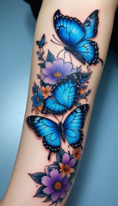 blue butterflies and flowers on the arm