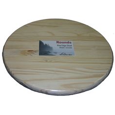 round wooden board with rounded edge and label on the bottom that says rounds, fine wood