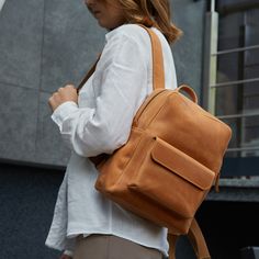 Our leather backpack is a stylish and functional companion for active men and women. It is made from genuine leather, which ensures the strength and durability of the product. Available in two sizes. The backpack is capacious and functional, as it has a special compartment for a tablet (size S) or for a laptop (size M). Key Features of Our Leather Laptop Backpack The backpack features adjustable shoulder straps. On the top, there is a convenient handle for carrying it like a leather laptop bag. Functional Soft Leather Backpack For Daily Use, Functional Soft Leather Everyday Backpack, Everyday Leather Backpack, Functional Soft Leather Backpack, Functional Soft Leather Rectangular Backpack, Everyday Functional Soft Leather Backpack, Functional Rectangular Soft Leather Backpack, Leather Backpack With Large Capacity For Everyday, Casual Backpack With Leather Lining For Everyday