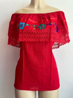 100% Authentic Mexican Shirt This Shirt is gorgeous. Material: 85% Cotton /15% Acrilic Color:red Size:One sizes fit most  Ebroidery Mexican shirt Folk Fabric Flowers Mexican Tunic Traditional Embroidery This shirt is perfect for any occasion This Shirt is meant to provide extreme comfort throughout the day The perfect gift for her NOTE:"The floral wall remain the same but the embroidery colors vary on each shirt. Red Bohemian Embroidered Top, Off Shoulder Mexican Blouse, Embroidered Red Cotton Peasant Top, Red Embroidered Folk Blouse, Bohemian Red Embroidered V-neck Top, Mexican Shirts, Mexican Blouse, 5 De Mayo, Perfect Gift For Her