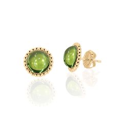 "The perfect pair of everyday affordable Peridot Stud Earrings for women. Deep lime hued Peridot cabochons are set in polished 14K Gold Filled Metal. Secures with push backs. Come in three sizes. Peridot is Birthstone for August and Gemstone for Celebrating 16th Anniversaries. PRODUCT INFORMATION - METAL: 14K Gold Filled - LENGTH: 0.31\" or 8MM - WIDTH: 0.31\" or 18MM - BACKING: Friction / Pushbacks - GEMSTONE: Peridot - STONE CUT: Round Cabochon - STONE SIZE: 6MM - NUMBER OF STONES: 2 - STONE Q Green Gemstone Earrings In 14k Gold, Classic Green Peridot Earrings, Green Round Earrings For May Birthstone, Green Earrings For May Birthstone, Gold Peridot Earrings Fine Jewelry, Green 14k Gold Birthstone Earrings, 14k Gold Green Birthstone Earrings, Round Green 14k Gold Earrings, Green 14k Gold Round Earrings