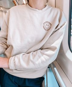 The crewneck sweatshirt is soft, comfortable, and true to size. If you would like the oversized look, I recommend sizing up! color: Sand Model is 5'3 Wearing a medium Gildan crewneck sweatshirt- ✿ 8-ounce, 50/50 cotton/poly ✿ Double-needle stitching at waistband and cuffs ✿ 1x1 rib knit collar, cuffs and waistband with spandex Design Quality - ✿ Design is professionally embroidered into the crewneck to ensure high quality, durable, and easy care Care Instructions - ✿ machine wash cold ✿ Do not b Everyday Crew Neck Sweatshirt, Casual Sweatshirt With Embroidered Graphics, Cozy Long Sleeve Sweatshirt With Embroidered Logo, Everyday Relaxed Fit Sweatshirt With Embroidered Text, Relaxed Fit Embroidered Sweatshirt For Everyday, Trendy Crew Neck Sweater With Letter Embroidery, Cozy Long Sleeve Sweatshirt With Letter Embroidery, Basic Crew Neck Sweatshirt With Embroidered Graphics, Oversized Crew Sweater With Letter Embroidery