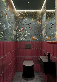 a bathroom with red and green wall paper